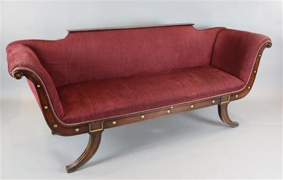 A pair of Regency style mahogany boat shaped settees, W.7ft 2in. D.2ft 1in. H.2ft 6in.